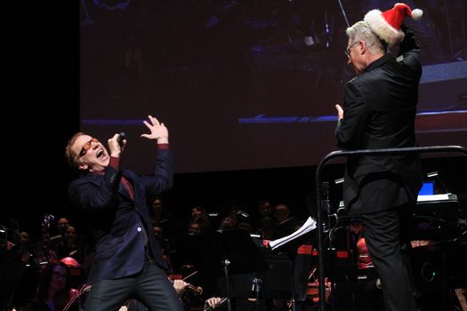 FRANCE, Paris: American composer Danny Elfman and the Lamoureux orchestra perform on the stage of the Grand Rex, in Paris, during the show Danny Elfman's music from the films of Tim Burton, on October 10, 2015.
