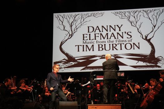FRANCE, Paris: American composer Danny Elfman and the Lamoureux orchestra perform on the stage of the Grand Rex, in Paris, during the show Danny Elfman's music from the films of Tim Burton, on October 10, 2015.