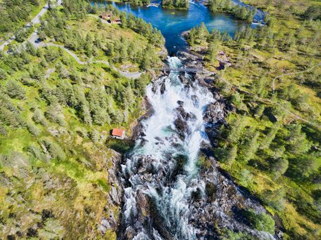 Popular norwegian waterfalls Likholefossen seen from above