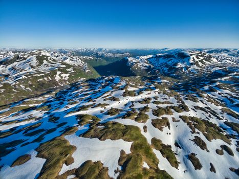 Scenic aerial view of norwegian mountains on sunny summer day