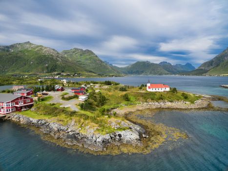Aerial view of tourist resort with Sildpollnes Church on Lofoten islands in Norway