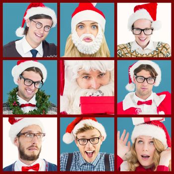 Composite image of smiling santa young woman with gift on her head