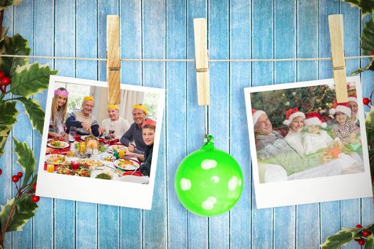 Hanging christmas photos against wooden planks