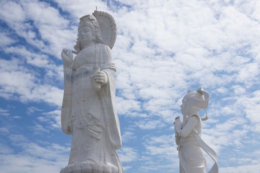 Hat Yai, Thailand -  13 Sept, 15 : The 20 metres high white jade statue of  Kuan Yin,  Goddess of  Compassion & Mercy is located on top of a hill at Hat Yai Municipal Park. It is about 1000 steps to the hilltop where there is 360 degree panoramic view of Hat Yai City and Songkhla.
