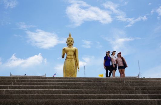 Hat Yai, Thailand -  13 Sept, 15 :  It is around 20 meters weighs 200 tons and was made in 1999 to celebrate the King of Thailand's 6th Cycle Birthday Celebration which was his 72nd birthday. With His right had raised with forefinger and thumb touching each other, this mudra denotes 'Intelligence, Intellect and Integrity'. Hat Yai Observatory is Hat Yai's deep sky observation for science and astronomy. Located in the vicinity of this temple.