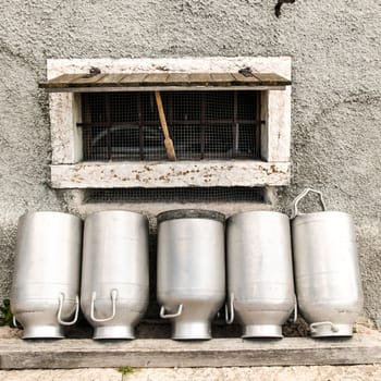 Vintage milk cans in Northern Italy.
