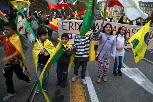 ITALY, Turin: Children join as thousands march through Turin, Italy on October 13, 2015 to show solidarity with the people of Turkey, after the weekend's bombings in Ankara that left at least 97 dead. Demonstrators protest against the Turkish government, blaming the administration for the attack. Some Kurdish and leftist activists have asserted that these bombings were perpetrated in part by Turkey's governing AKP administration, intended as a blow to the pro-Kurdish HDP opposition ahead of the snap parliamentary elections in November. 