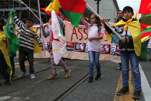 ITALY, Turin: Children join as thousands march through Turin, Italy on October 13, 2015 to show solidarity with the people of Turkey, after the weekend's bombings in Ankara that left at least 97 dead. Demonstrators protest against the Turkish government, blaming the administration for the attack. Some Kurdish and leftist activists have asserted that these bombings were perpetrated in part by Turkey's governing AKP administration, intended as a blow to the pro-Kurdish HDP opposition ahead of the snap parliamentary elections in November. 