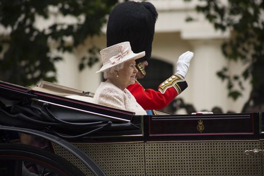 Queen Elizabeth II in an open carriage with Prince Philip. Trooping the colour 2015 marking the Queens official birthday, London, UK