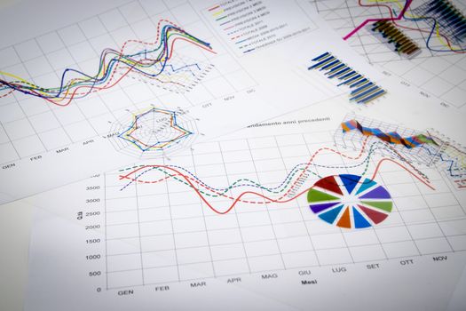 stack of paper documents with financial reports and statistic information data isolated on white background