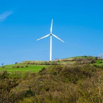 single wind turbine produces green clean energy