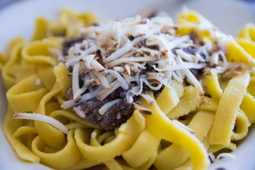 handmade tagliatelle with radicchio, mushrooms and smoked ricotta