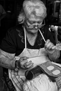 BURANO, ITALY CIRCA SEPTEMBER 2015: Burano is an island in the Venice lagoon known for the centuries-old craftsmanship needle lace of Burano.