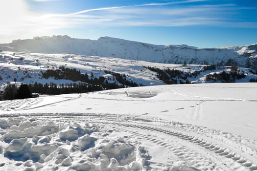 Ski slopes covered with snow on the Italian Alps.