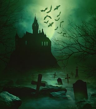 Spooky castle with eerie graveyard down below
