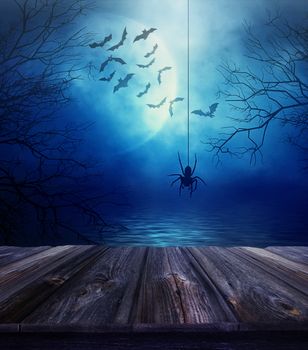 Wooden floor with spider and spooky Halloween background