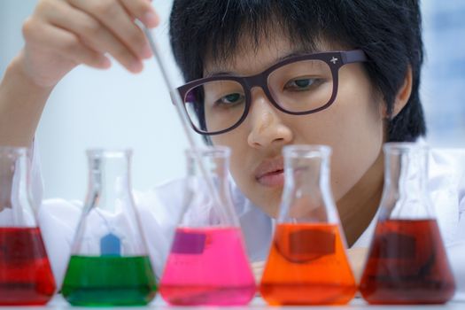 Researcher working with chemical