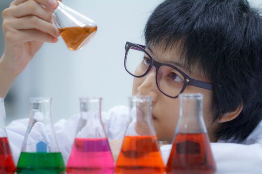 Researcher working with chemical