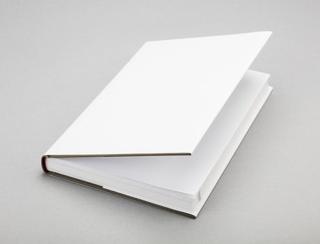 Blank book with ajar white cover