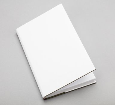 Blank book with ajar white cover