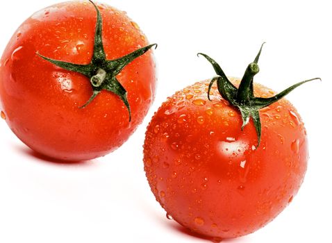 Two Raw Ripe Tomatoes with Droplets isolated on white background