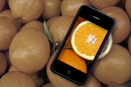 Fresh oranges and iphone