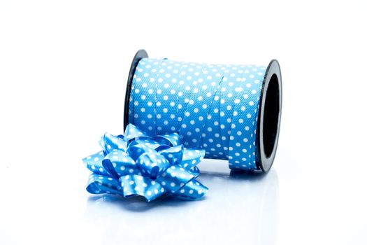 blue satin gift bow. Ribbon. Isolated on white, christmas object