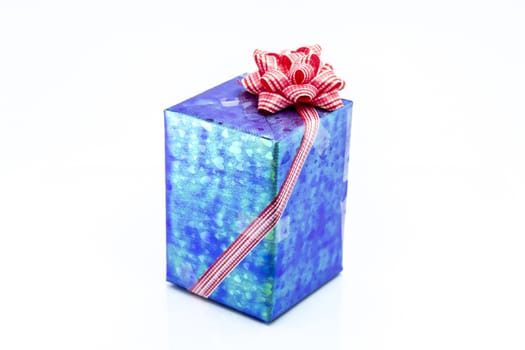 blue gift box with red ribbon bow, isolated on white