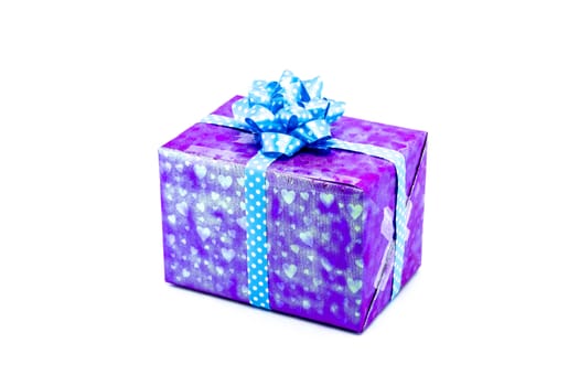 purple gift box with blue ribbon bow, isolated on white