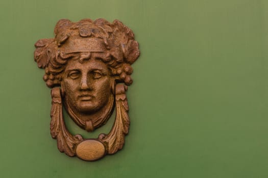 Close up of old door in Florence, Italy.