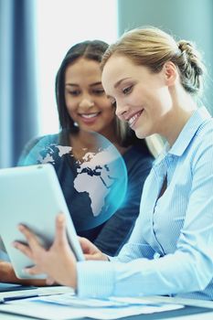 global business, people and technology concept - smiling businesswomen with tablet pc computer and world globe projection meeting in office