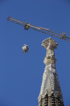 Crane working on tower at Sagrada Familia, Barcelona, Spain