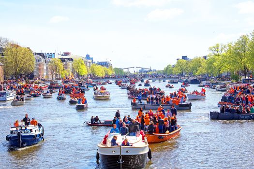 AMSTERDAM - APR 27: People celebrating Kings Day in Amsterdam on