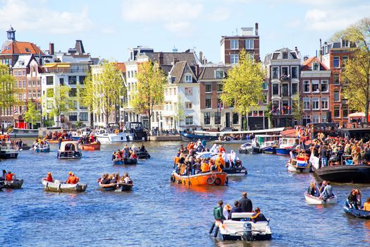 AMSTERDAM - APR 27: People celebrating Kings Day in Amsterdam on April 27. 2015 in the Netherlands