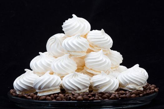 French vanilla meringue cookies and  coffee beans