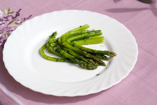 green asparaguses with the fresh dill