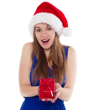 girl in a Christmas cap gift to rejoice on white background.