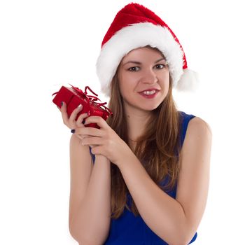 girl in a Christmas cap gift to rejoice on white background.