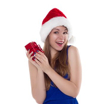 girl in a Christmas cap gift to rejoice on white background.