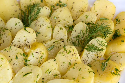 Delicious boiled potatoes with dill and olive