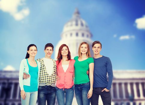 education and people concept - group of smiling students standing