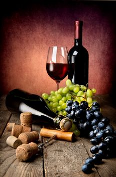 Winy still life on a wooden table