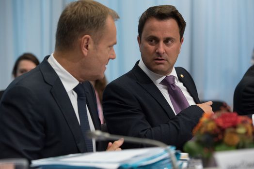 BELGIUM, Brussels: Council President Donald Tusk (R) and Prime Minister Xavier Bettel (R) pictured on the start of the Tripartite meeting.Discussions in the social summit focused on Boosting convergence, jobs and growth towards a strengthened role of social partners. The summit also discussed the refugee crisis throughout Europe and how to address the boats of people flooding in from Turkey. 