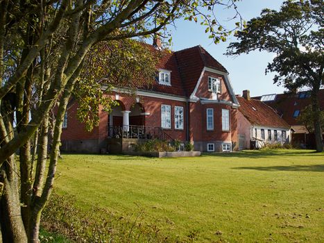 Colored traditional classical Danish house by the sea ocean