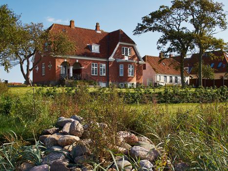 Colored traditional classical Danish house by the sea ocean