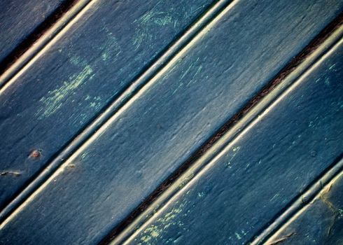 Dark Blue Cracked Wooden Plank Background Diagonally closeup
