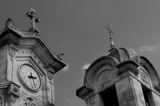 Antique Chapel with Seagull on Tip and Bell Tower on Cloudy Sky background Outdoors. Monochrome Toned