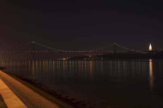 lisbon ponte 24 april over the river Tagus in Lisbon by evening