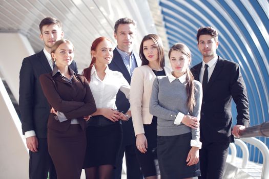 Portrait of business team of men and women in modern building
