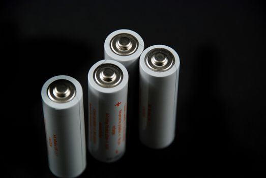 isolated pictores of electrical batteries on black background